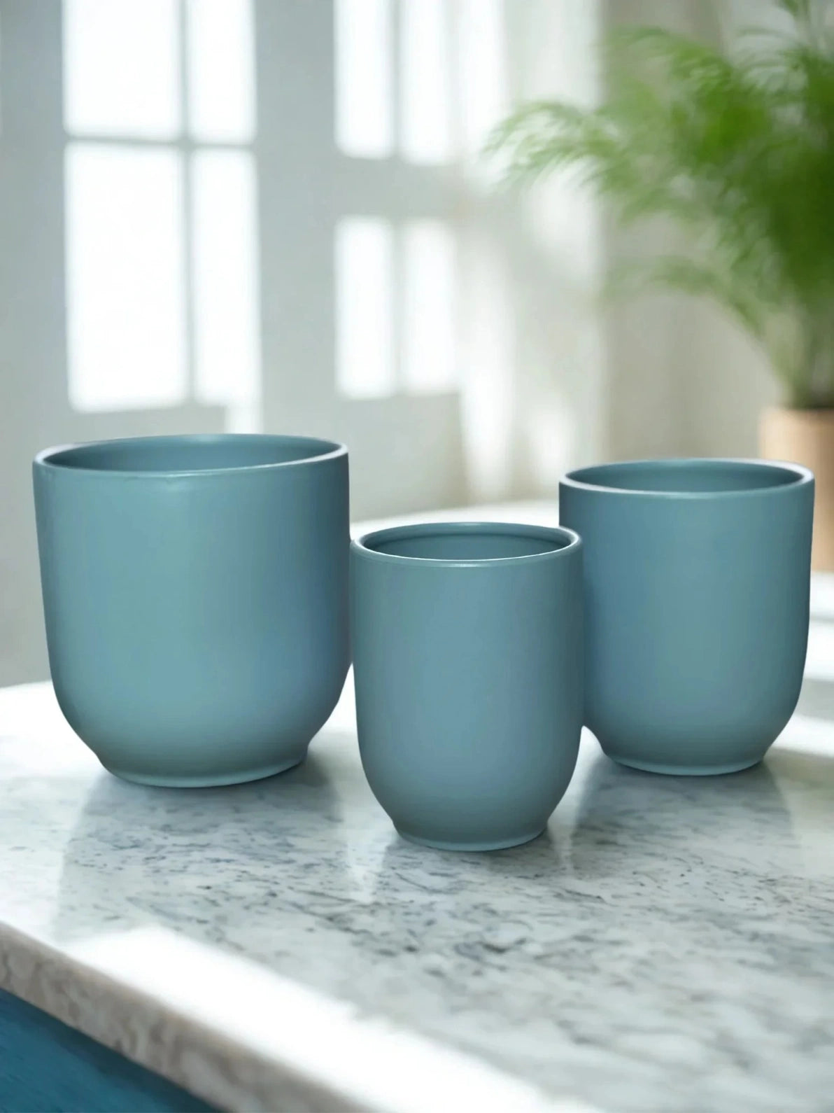Matte Blue Short Pot, vibrant ceramic planter for modern decor and small indoor plants in Dubai.