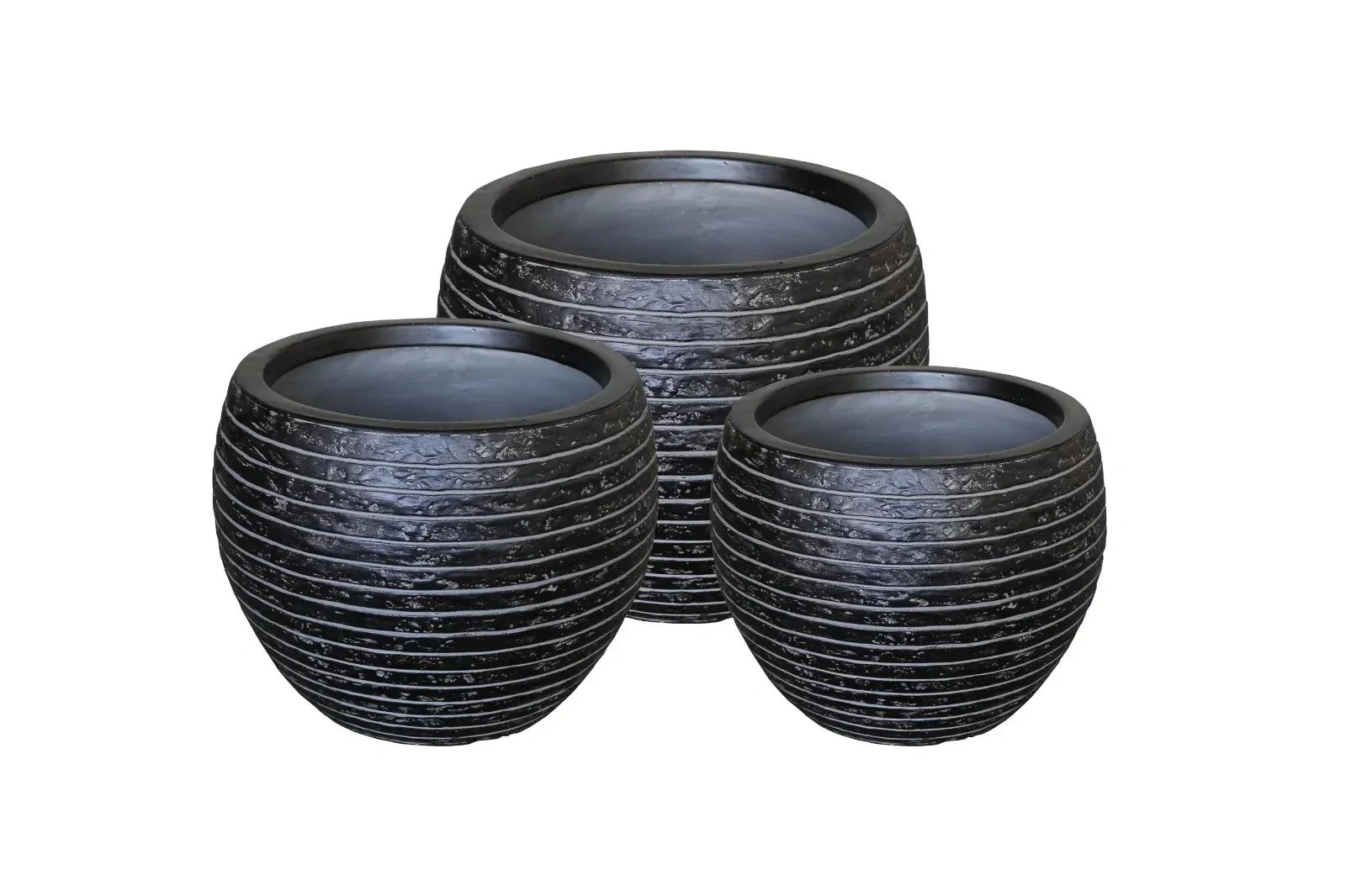 Round Black Pots, sleek minimalist planters for modern home and office decor in Dubai.