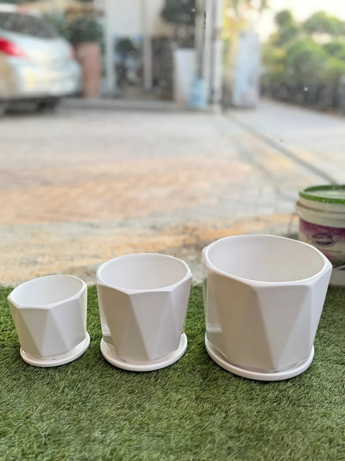White Ceramic Planter Set (Set of 3) with modern geometric design, perfect for indoor/outdoor plants in Dubai.